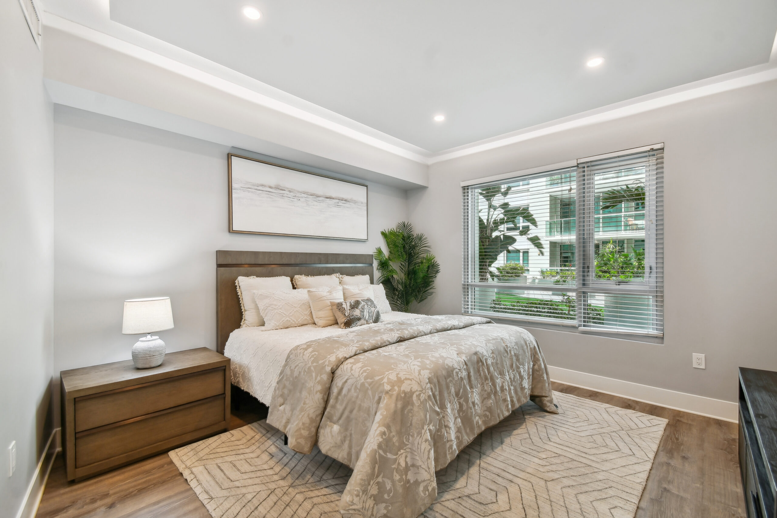 Luxury condo bedroom in The Place in Channel District